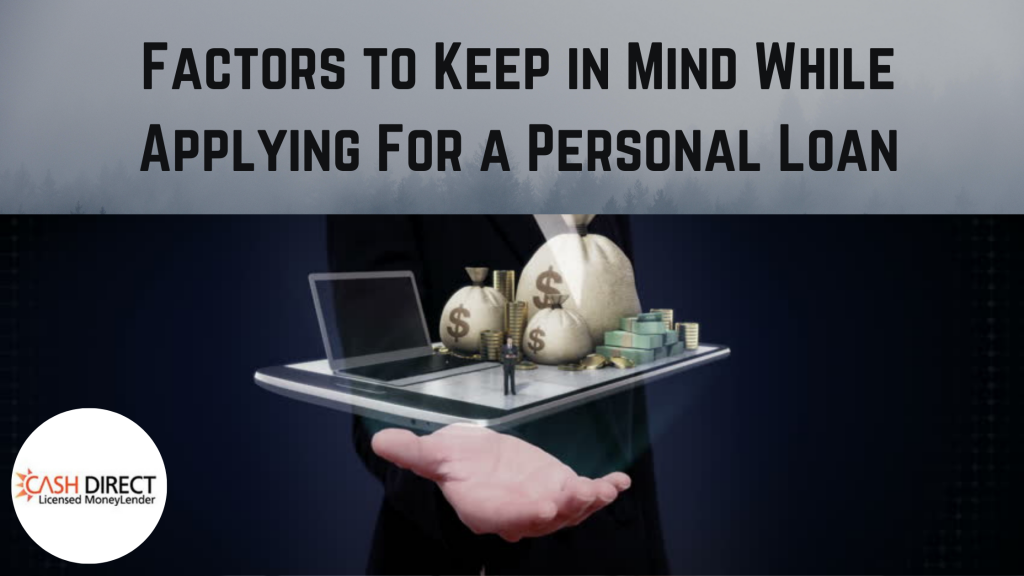 A glass tray holding a laptop, a small man, and bags of money presumably obtained from personal loans.