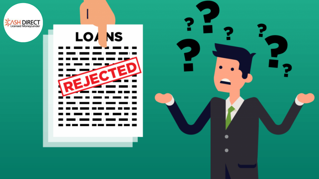 A man acting curious and surprised after his small business loan application is rejected.