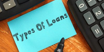 A borrower considering the different types of loans for a young adult before getting a loan
